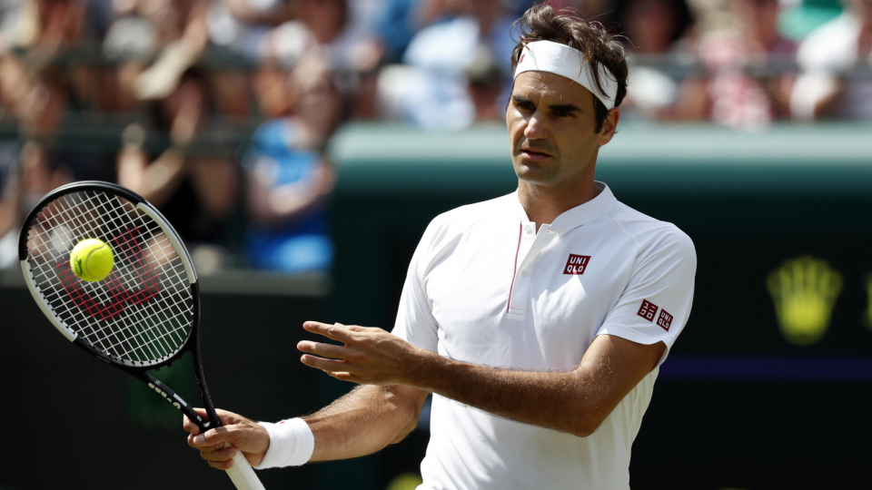 Na zdjęciu Roger Federer podczas ćwierćfinałowego meczu Wimbledonu 2018. Fot. PAP/EPA/NIC BOTHMA